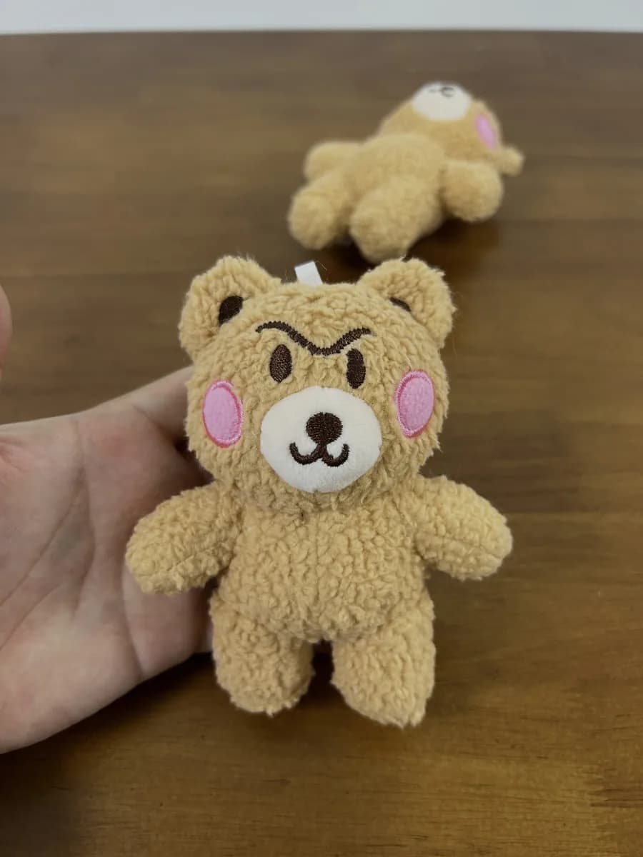 Knitted-look teddy bear plush toy