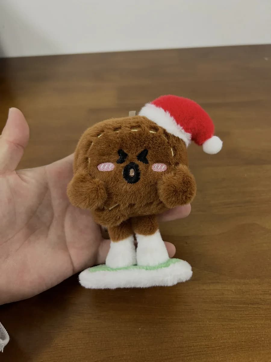 Bear plush toy in a Santa hat for holiday promotions