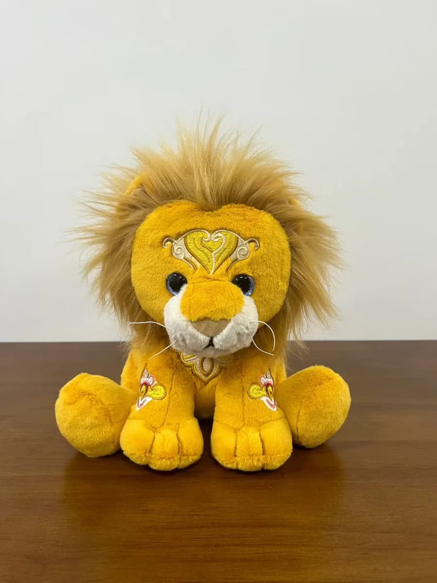 Lion plush toy with a dense yellow mane