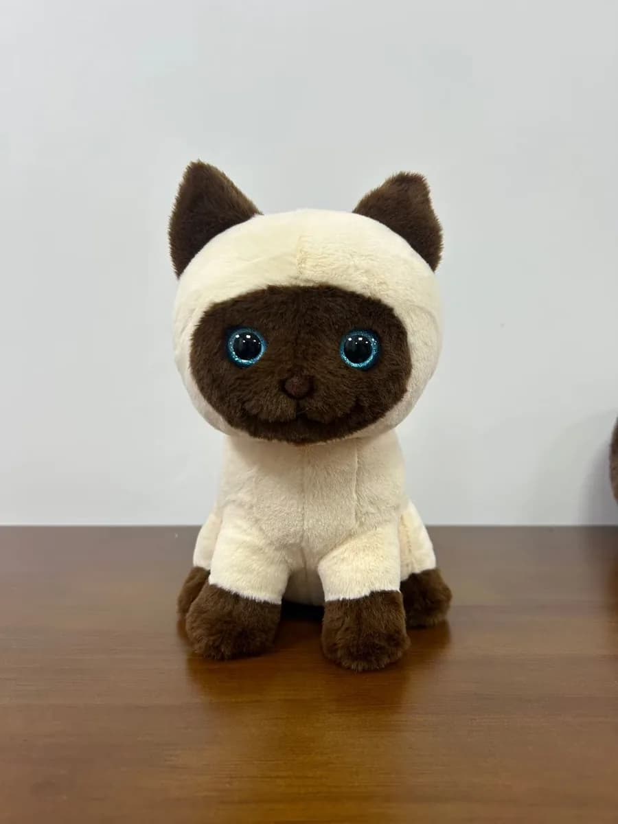 Siamese cat plush toy with embroidered blue eyes