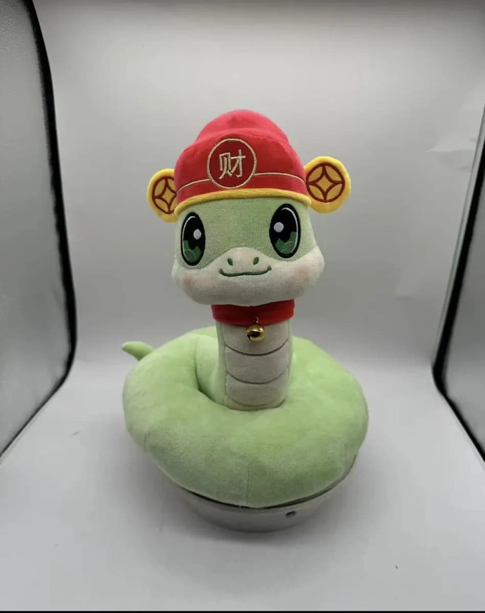 Snake plush toy with embroidered gold coin detail