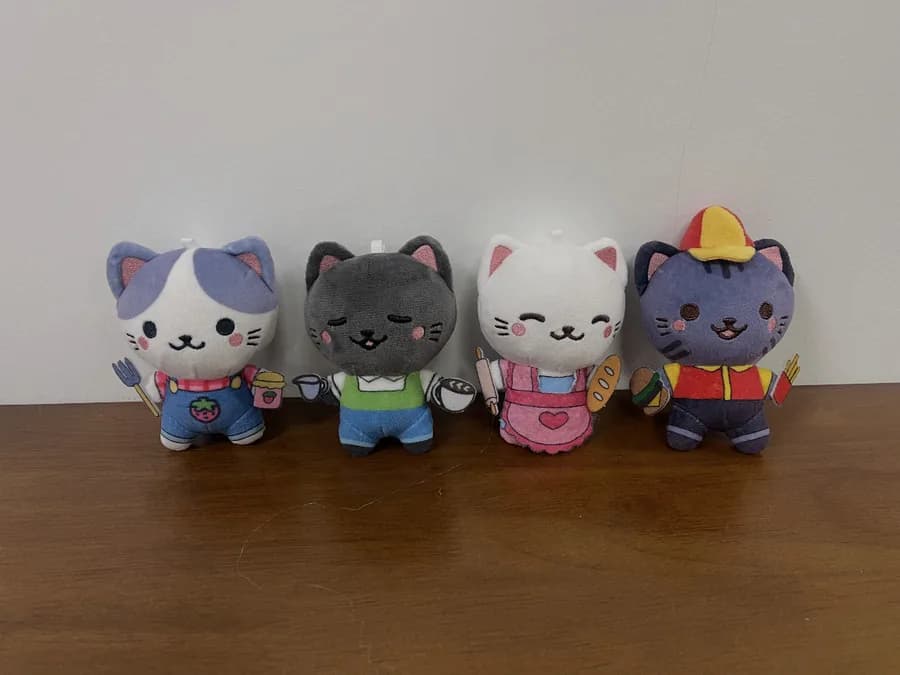 Collectible cat doll series in four colourways