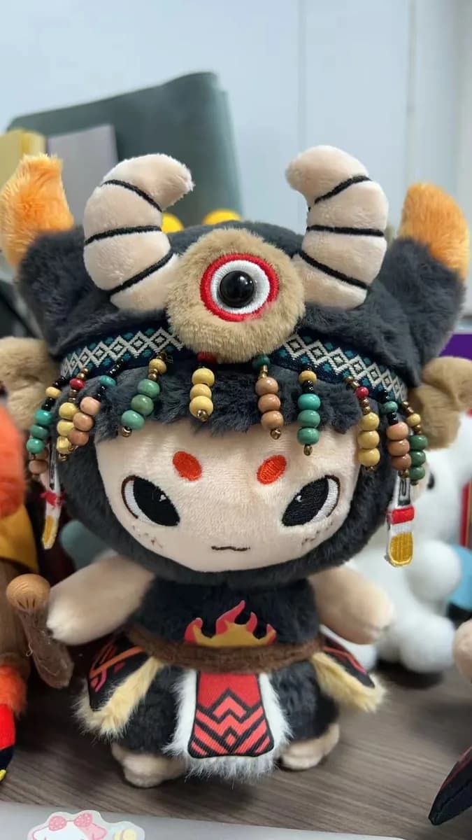 Opera character doll with beaded headdress