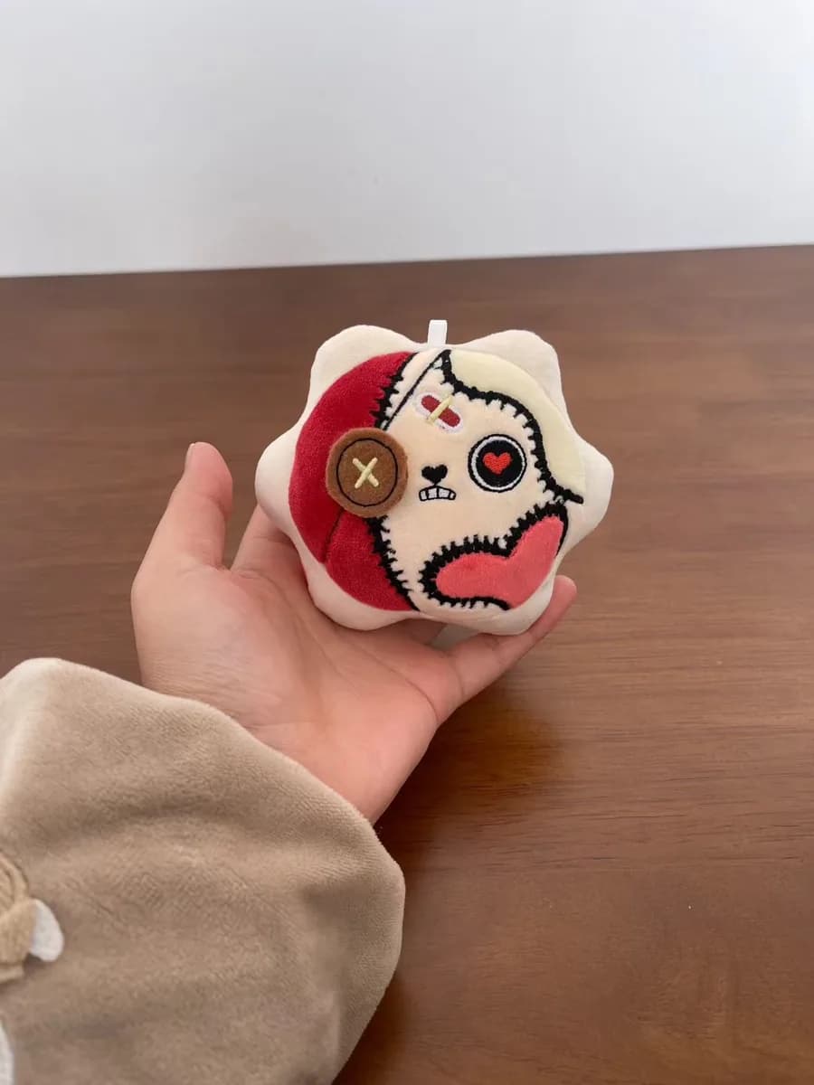 Opera mask plush keychain with contrast stitching