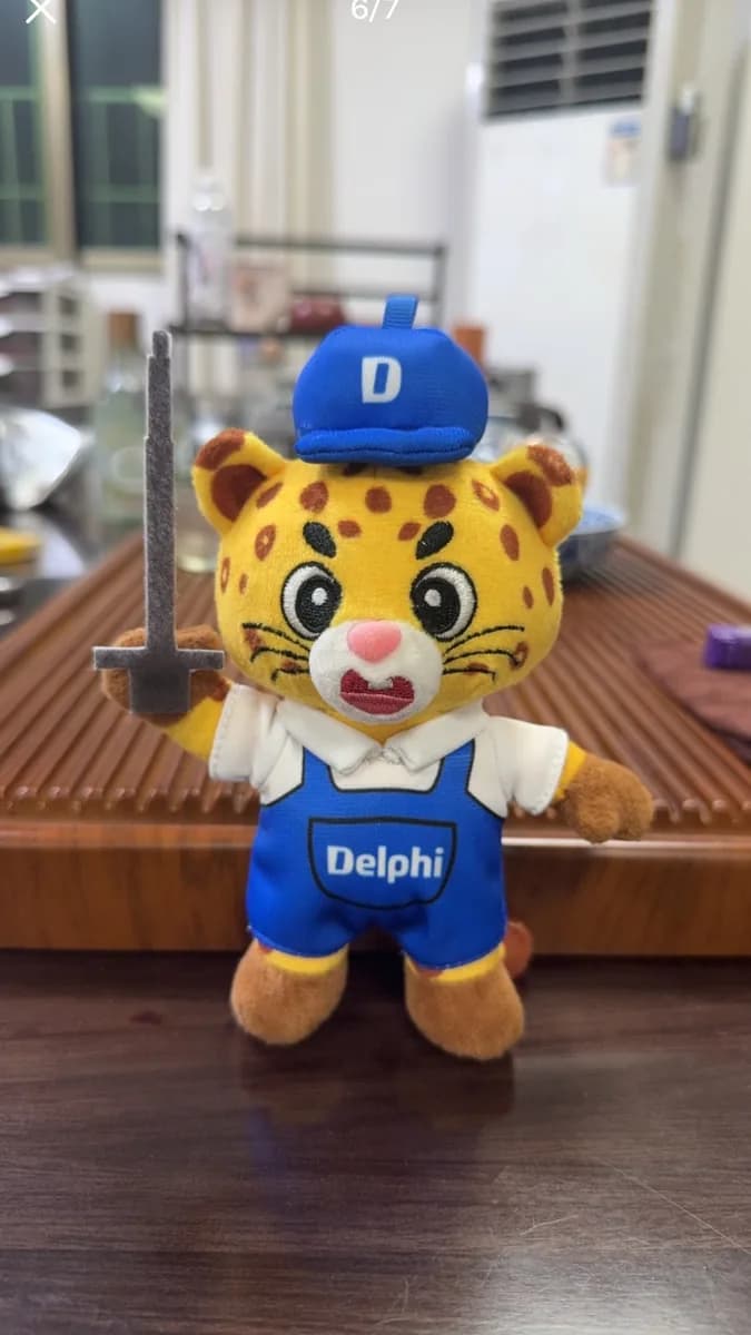 Custom sports mascot plush toy wearing a branded team jersey