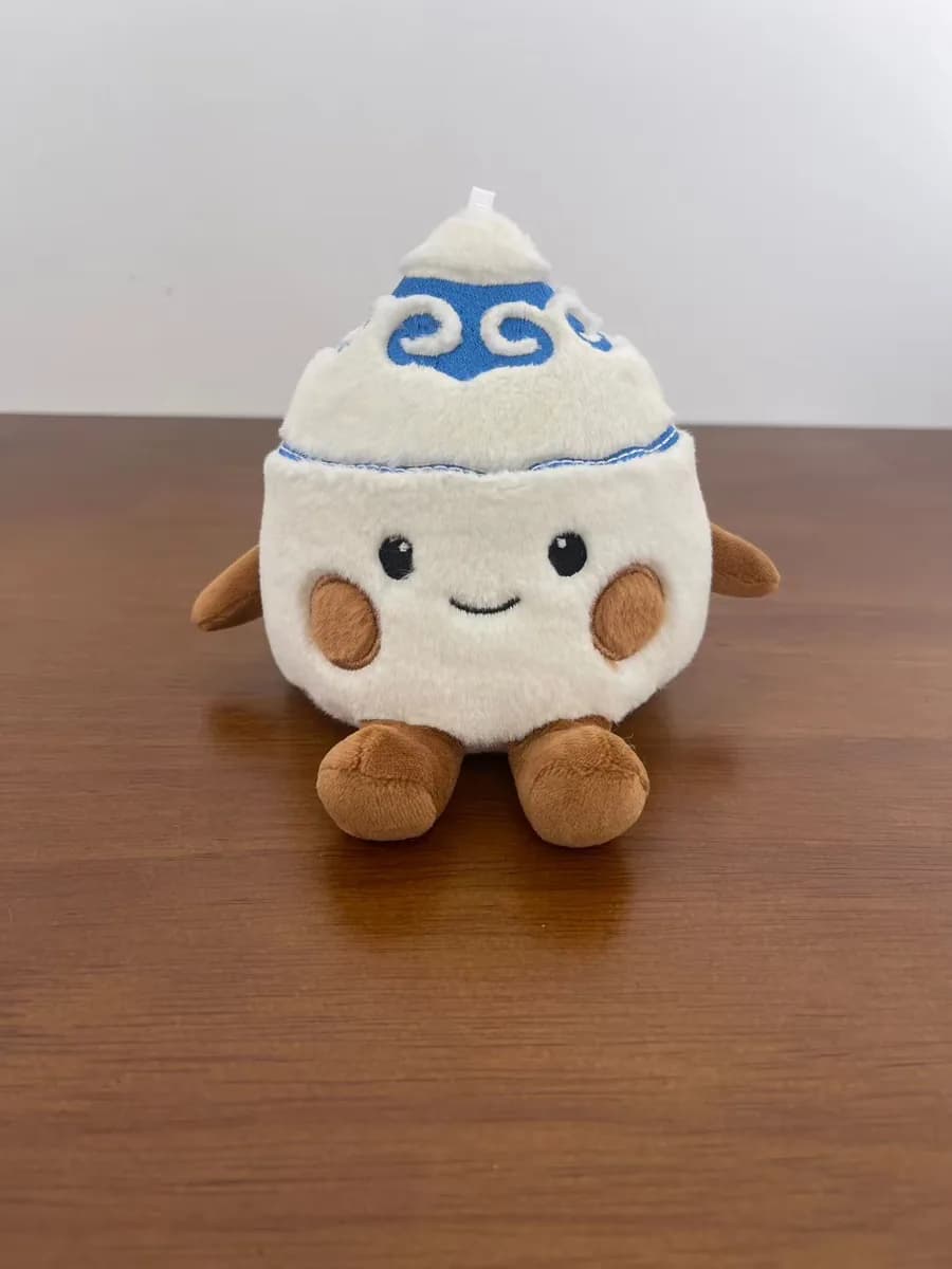 Dumpling plush toy with an embroidered hat