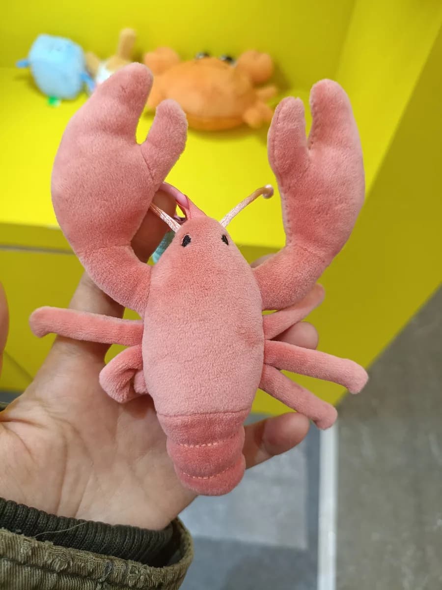 Pink lobster plush toy with wired antennae