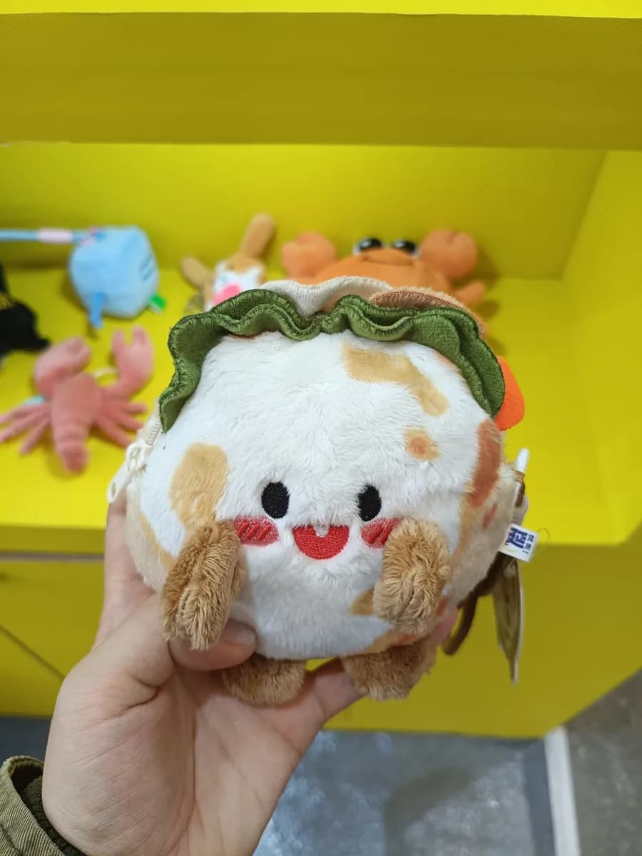 Taco character plush toy with layered fillings