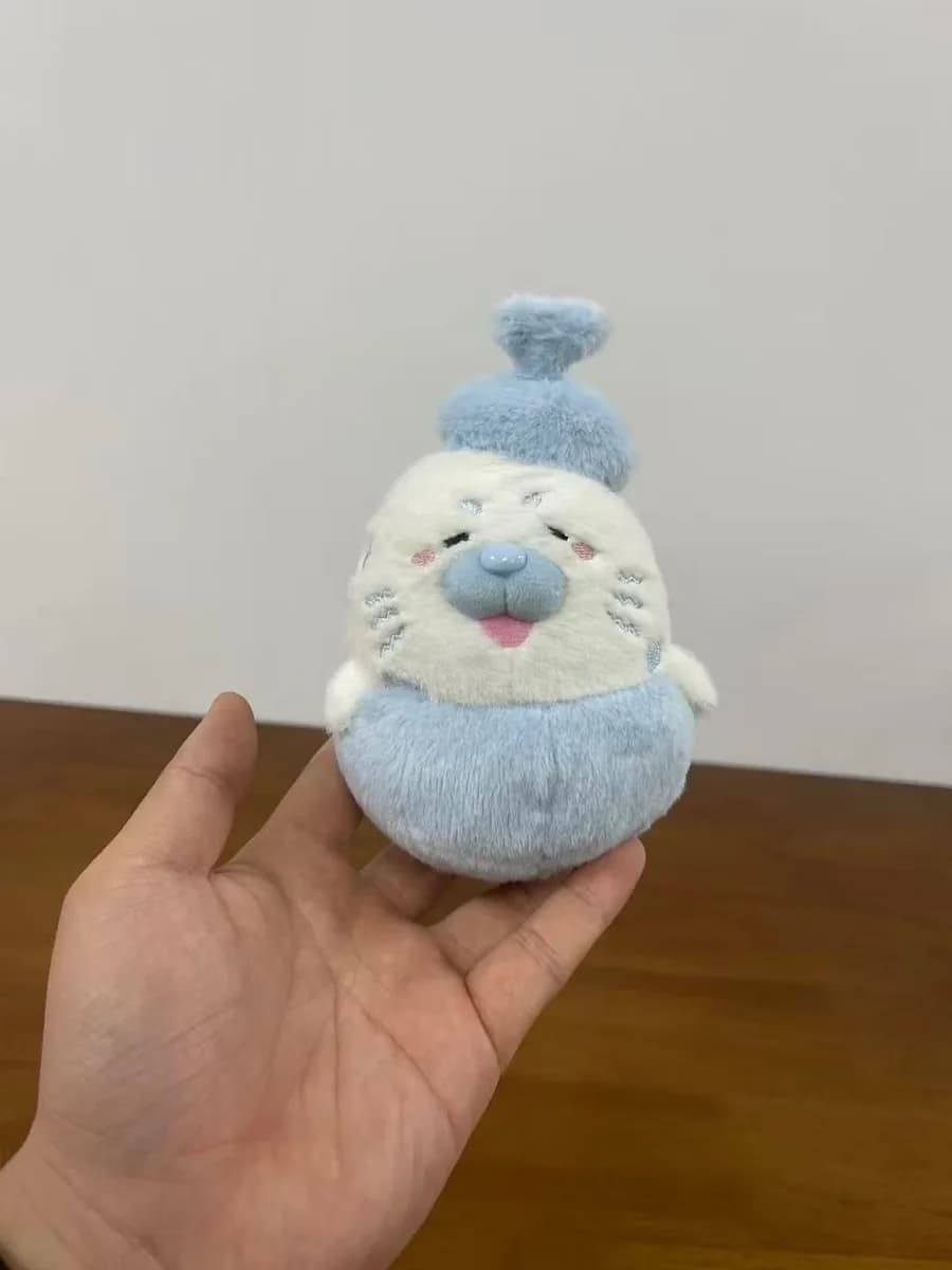 Teapot cat plush toy with blue and white print
