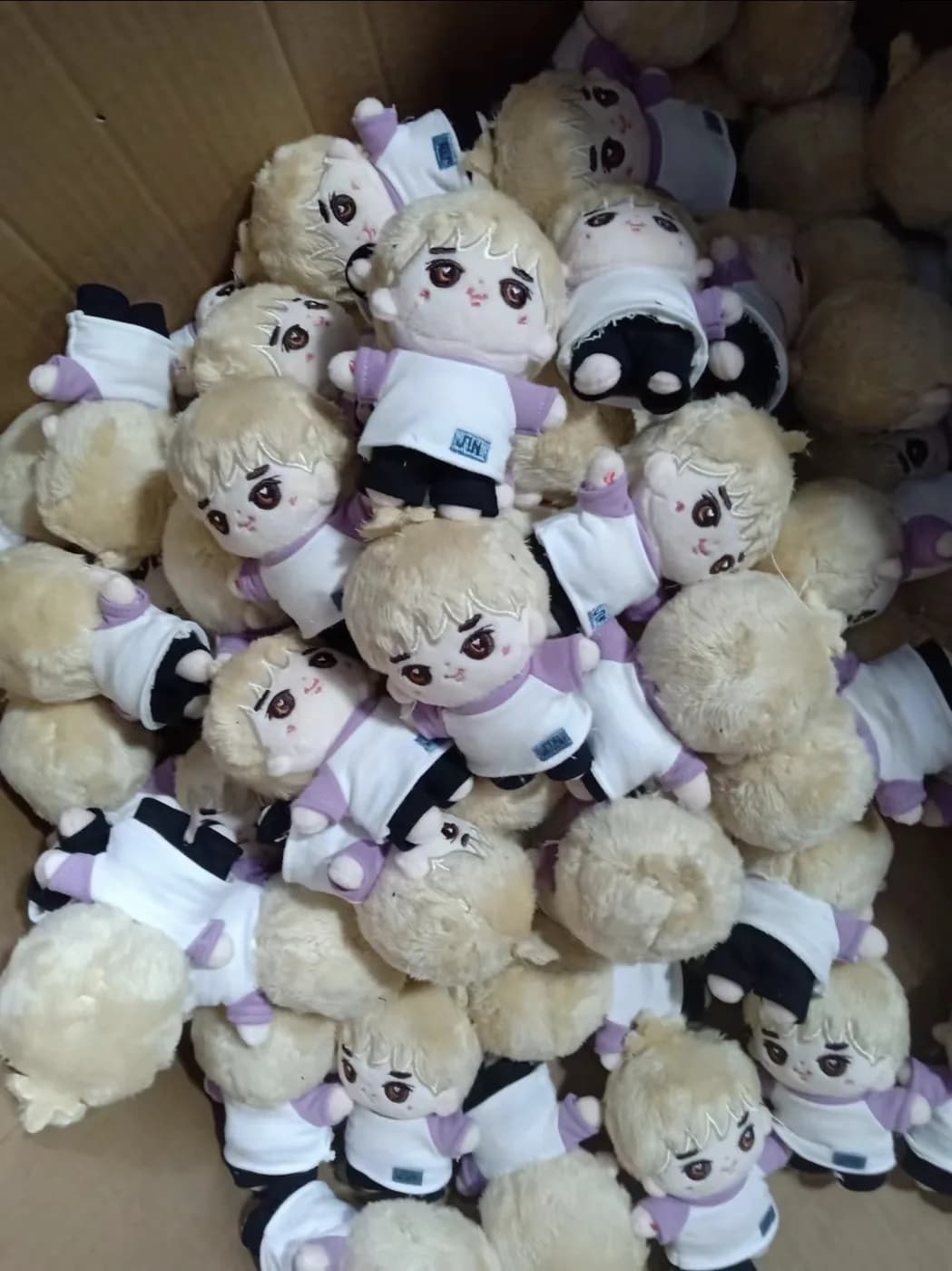 Finished promotional plush toys with hangtags attached